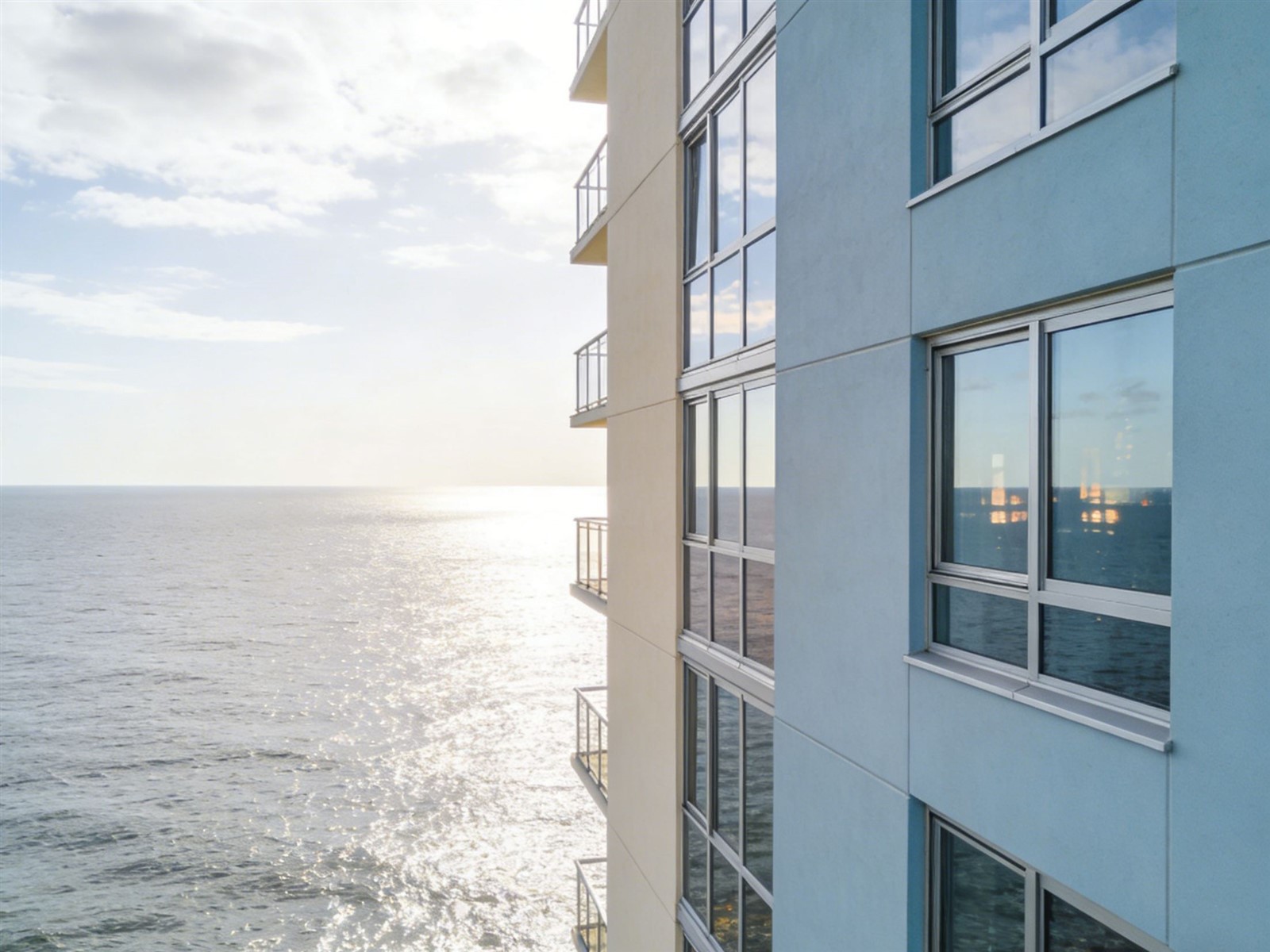 Custom impact windows for large-scale coastal development under construction Custom impact windows for large-scale coastal development under construction